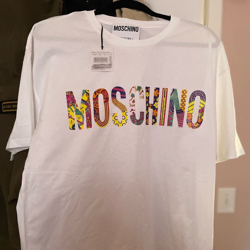 NWT- Authentic Mens Moschino Couture with tags . Size L and XL . Fits large .